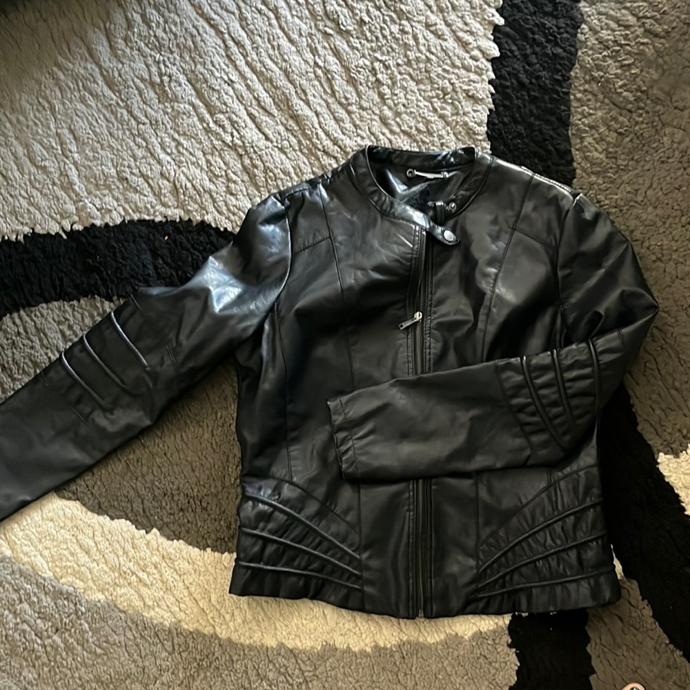 Black leather jacket with front zip